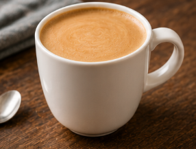 Flat white coffee with steamed milk